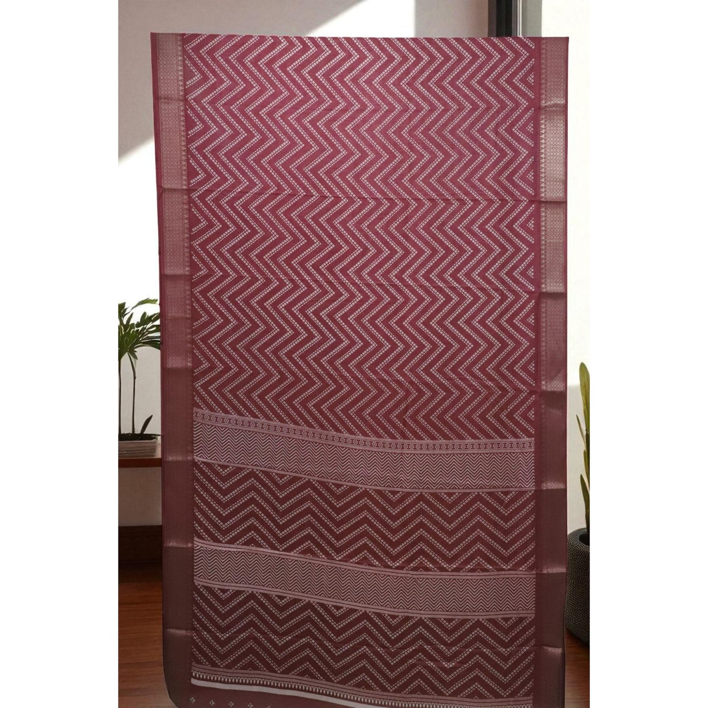 Rust Zig Zag Print Dola Silk Saree