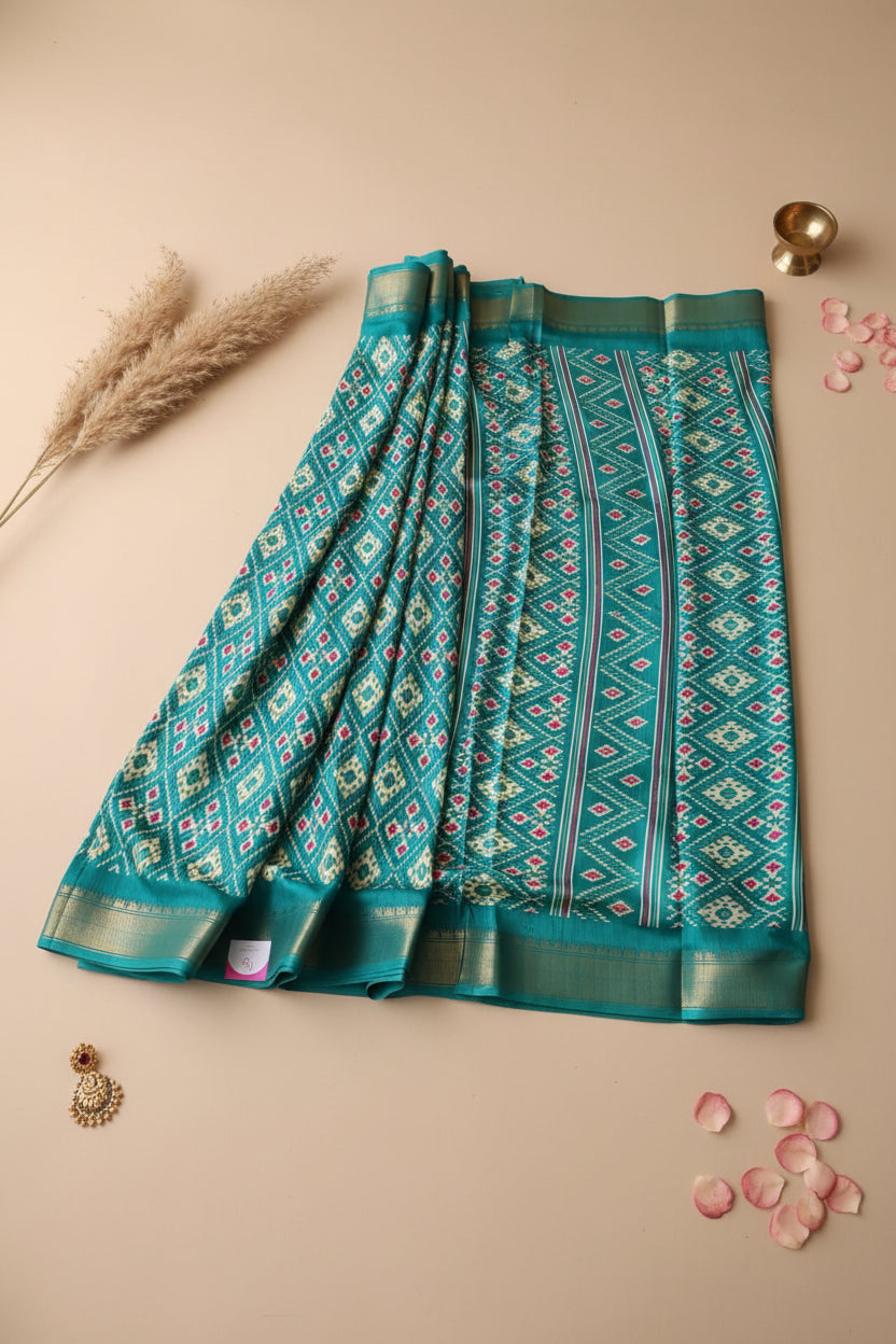 Green Patola Print Dola Silk Saree